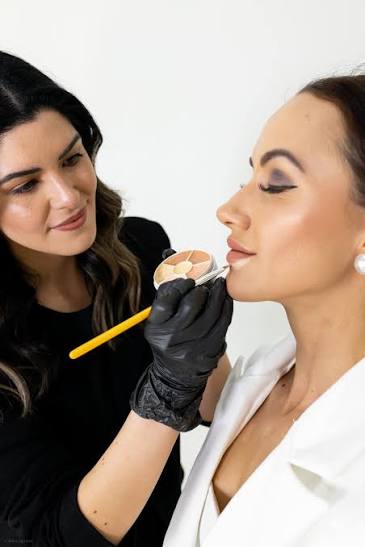 Lip colour demonstration during lip blush training
